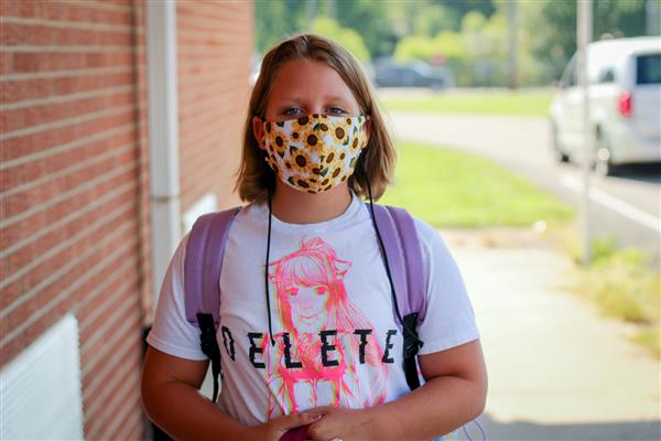 student smiles on first day of school